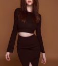 Bộ áo đen croptop tay dài và chân váy xẻ giữa Ngọc Trinh - JN42